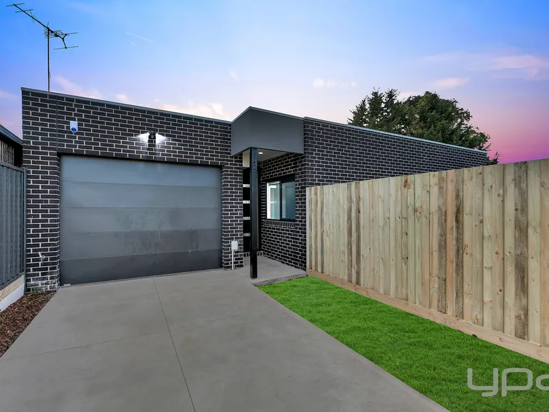 Modern Back Unit with Exceptional Features & Family living!
