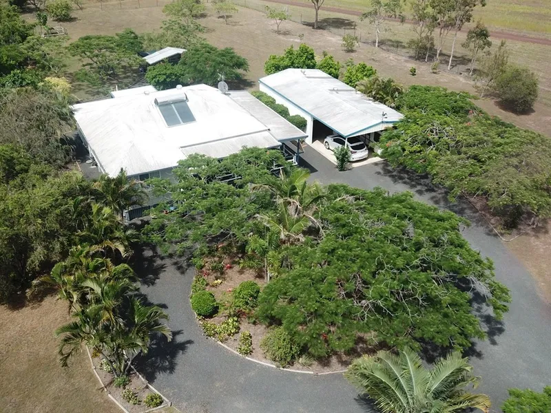 STUNNING COUNTRY HOME ON PARKLIKE ACREAGE