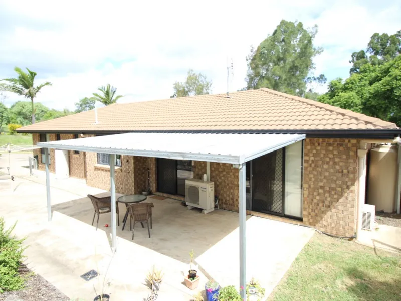 A Quiet Haven Tucked Away On An Acre+
