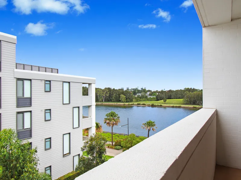 Ultra-contemporary living with water view