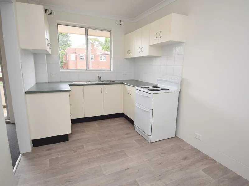 Beautifully Renovated Top Floor Unit