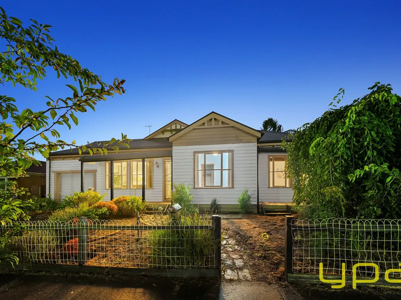 Quaint Family Home with Expansive Backyard 