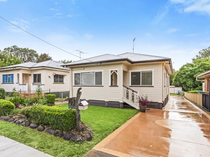 Immaculately Kept Character Home with Powered Triple Bay Shed!