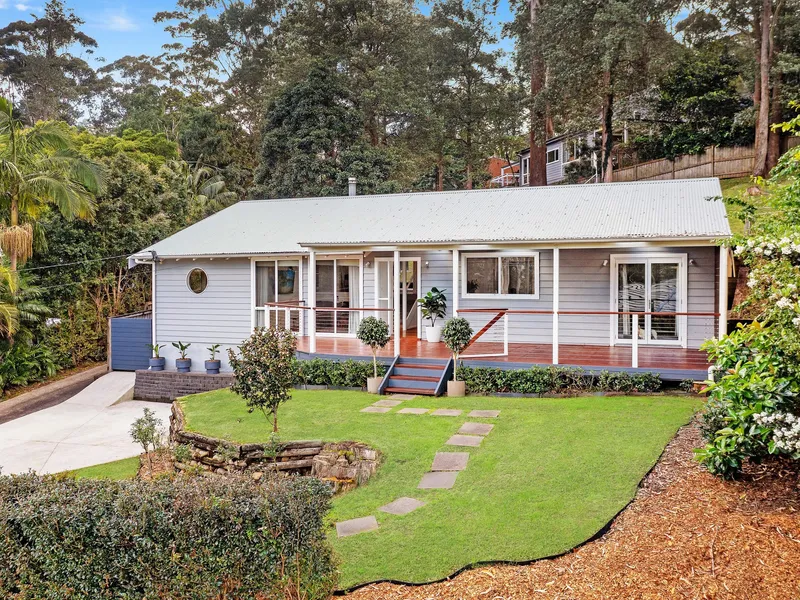 Split level design with coastal cottage charm features