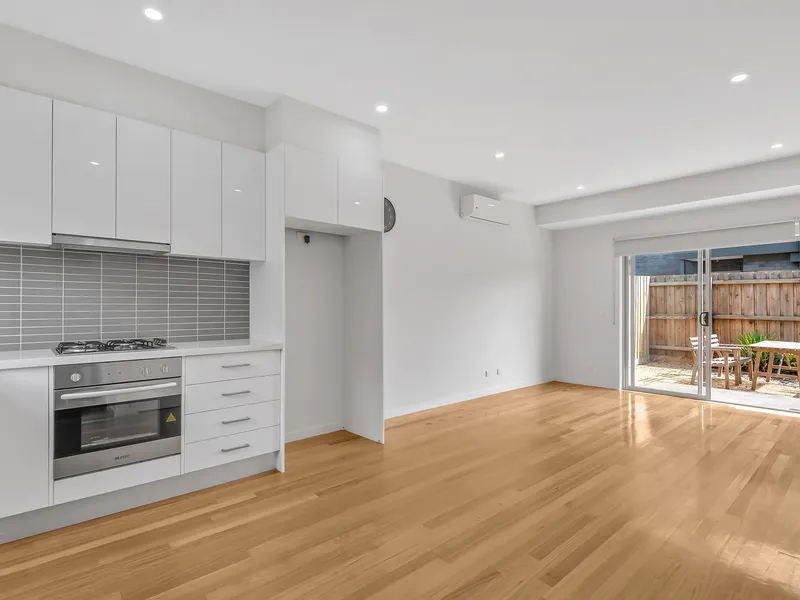 Stylish Townhouse With Low Maintenance Backyard