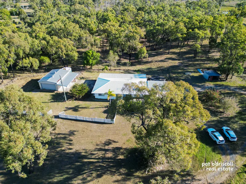 PICTURESQUE ACERAGE PROPERTY WITH TOWN WATER!