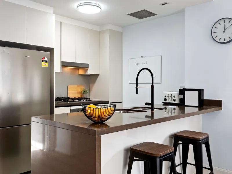 Modern and sunlit apartment with two balconies