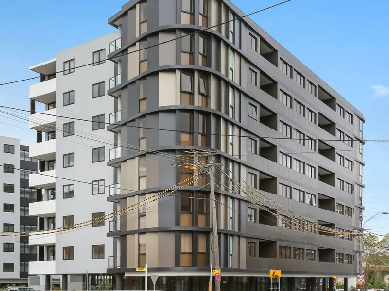Large 1 bedroom plus study with parking in a security building