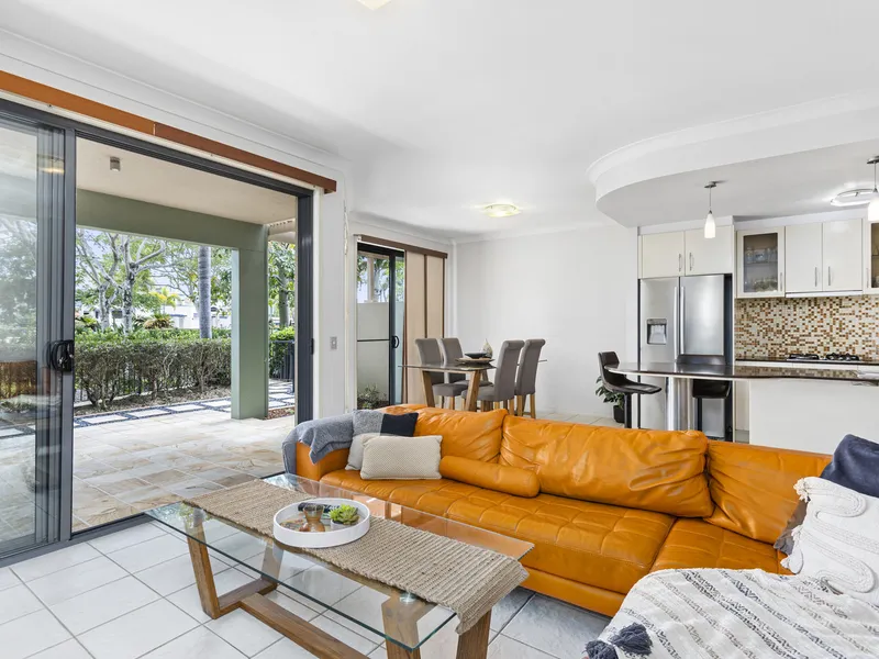 Spacious living backing onto Emerald Lakes Golf Course