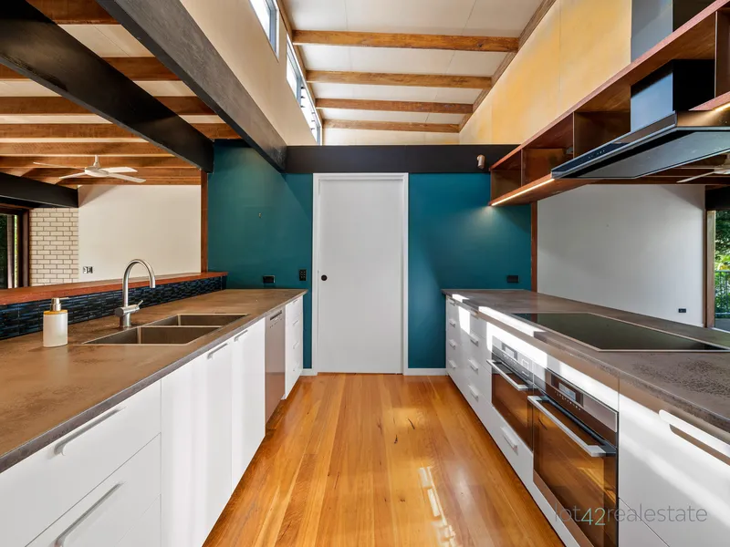 Entertain and enjoy riverfront Queensland living - Pool and Garden Maintenance Included!