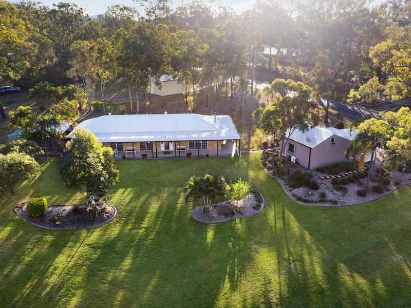 Acreage Living in a Prime Location !