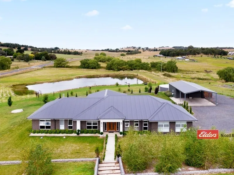 LUXURIOUS HOME ON ACRES!