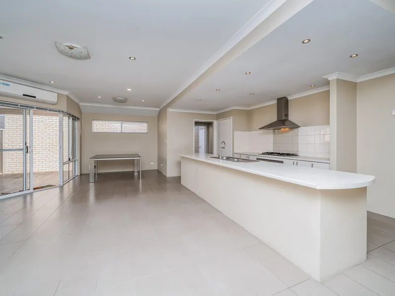 SPACIOUS LIVING AND LOW MAINTENANCE HOME!