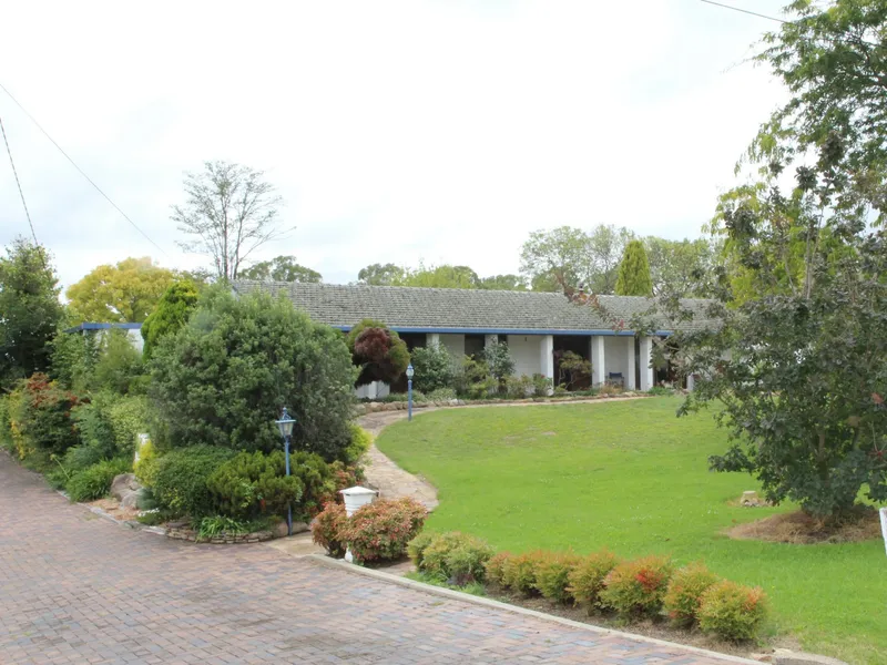 MUCH LOVED FAMILY HOME WITH A DIFFERENCE