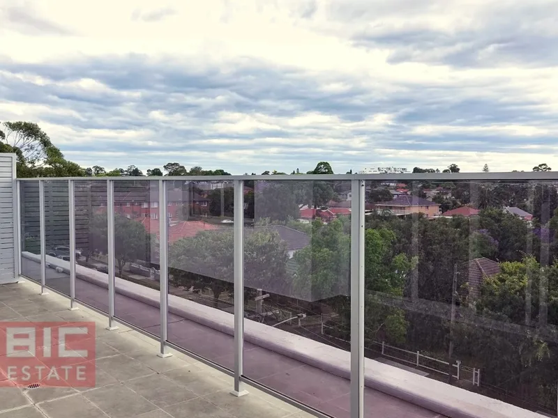 Top floor 3 Bedroom apartment with 2 car space