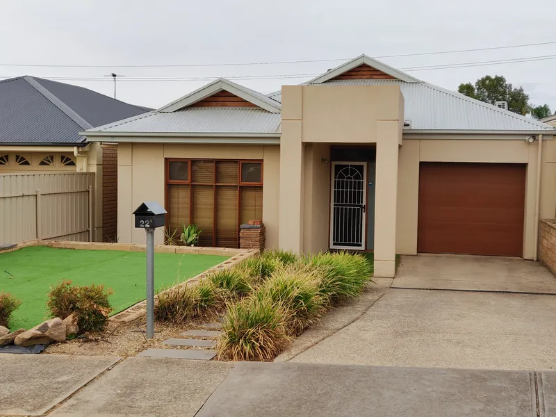 LOW MAINTENANCE LIVING - 2 LIVING AREAS!