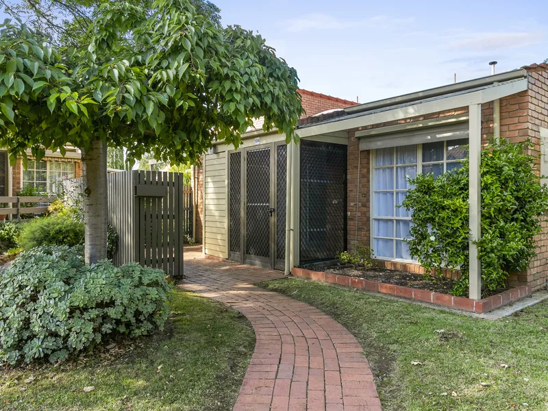 North facing, nestled amongst beautiful established gardens