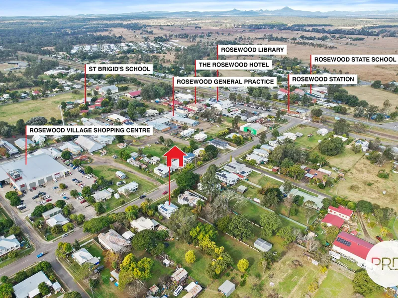 BEAUTIFUL QUEENSLANDER ON HALF ACRE