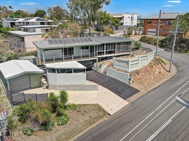 ELEVATED HIGHSET HOME WITH WATER VIEWS + SHED + SOLAR