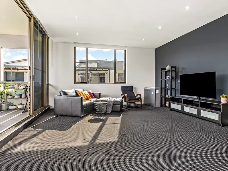 Stylish top floor apartment with serene outlook and home office