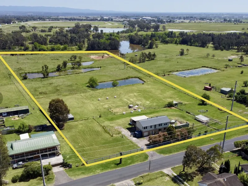 This massive 11 Acres farm with potential for investment /lifestyle living.