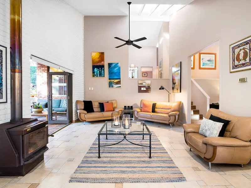 Split level residence with a private north to rear aspect and lush gardens