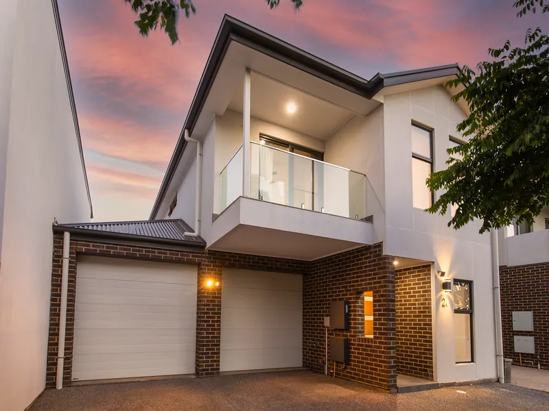 SUPERB TORRENS TITLE LUXURY TOWNHOME OVERLOOKING A RESERVE!!