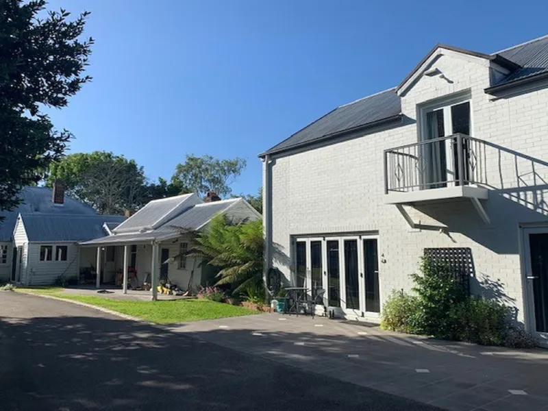 Two homes-1830's Famous Molecombe cottage and a lovely 4-bedroom family home, all on 2,269m2 and beautifully landscaped!