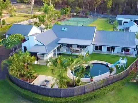 Huge family entertainer on acreage in the heart of town!