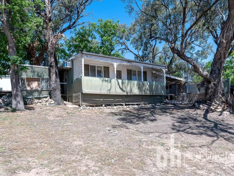 Superb opportunity to enjoy this peaceful near river location