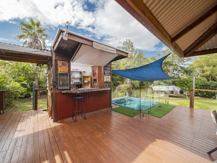 Rustic timber home on 1 acre in town