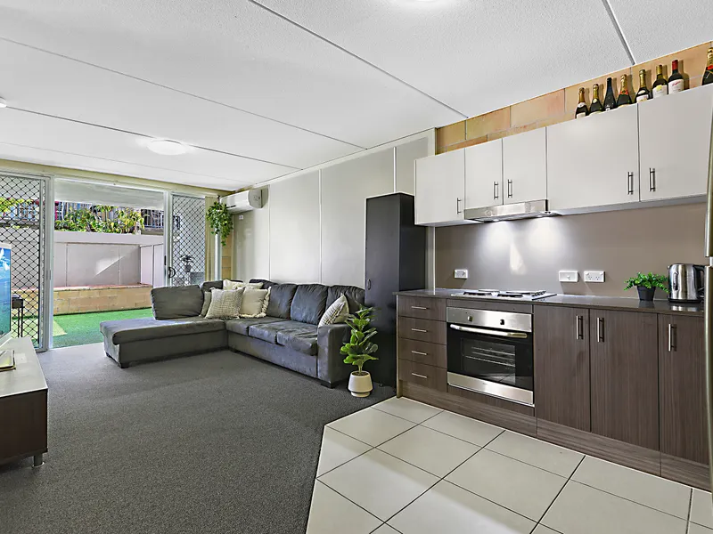 Ground floor delight with sunlit rear yard and 2 car secure car spaces!