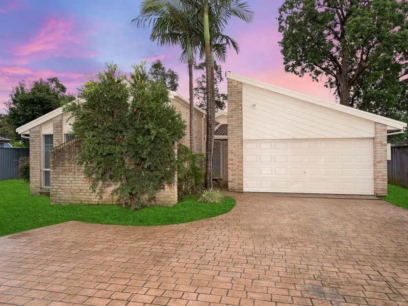 A RARE QUARTER ACRE OFFERING!