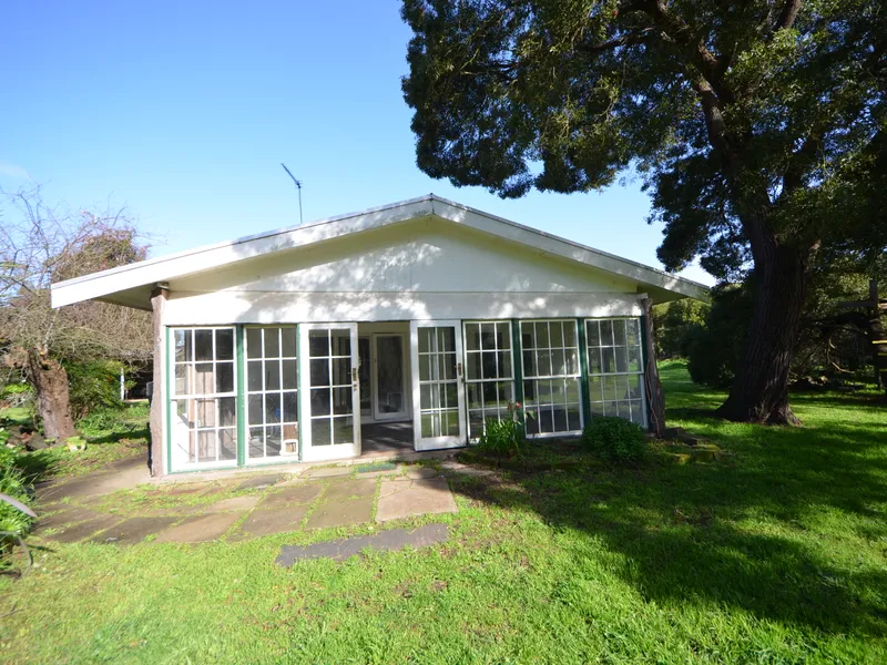 ENJOY THE SERENITY OF COUNTRY LIFE CLOSE TO TOWN