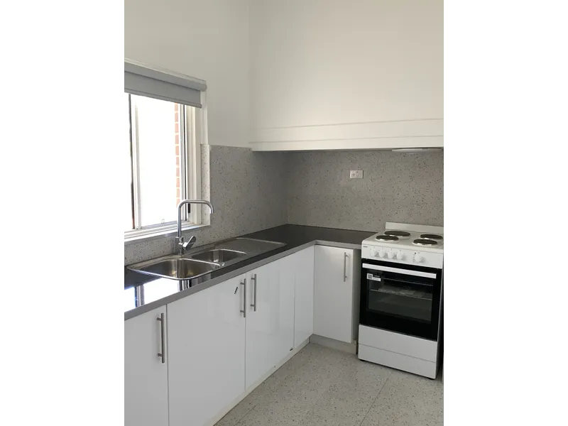 VERSITILE CENTRALLY LOCATED THREE BEDROOM FAMILY HOME