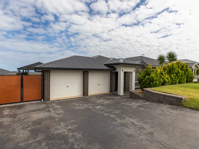 Fantastic Family Home/3-4 Bedrooms/Ducted R/C A/C/Double Garage /Large Under Cover Outdoor Entertaining Area/Great Location