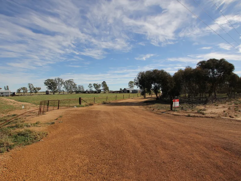 32.57 ACRE HOBBY FARM WITH LARGE HOME ON EDGE OF TOWN BOUNDARY