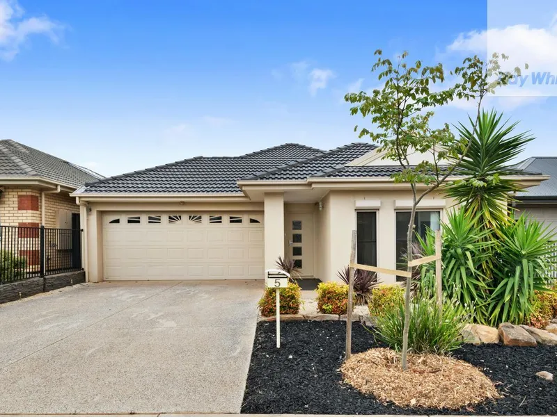 CLASSY 4 BEDROOM FAMILY HOME