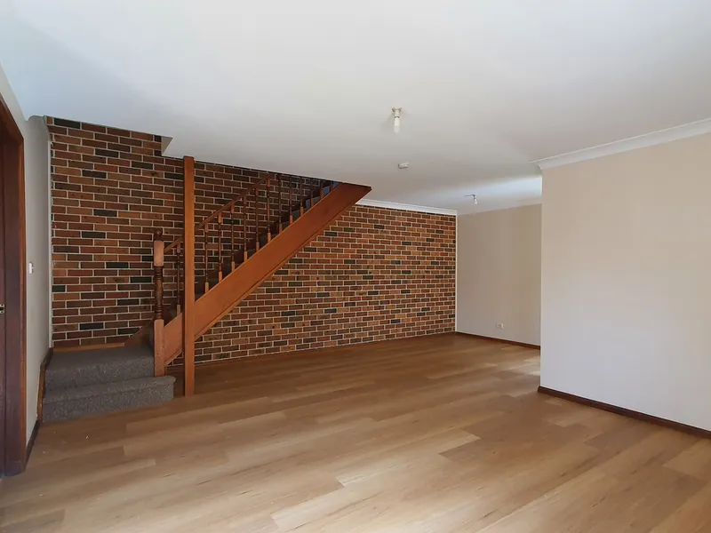 NEWLY UPDATED THREE BEDROOM TOWNHOUSE IN PERFECT LOCATION