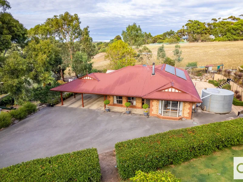 2.8 acre property in the 'Vale with home & shed