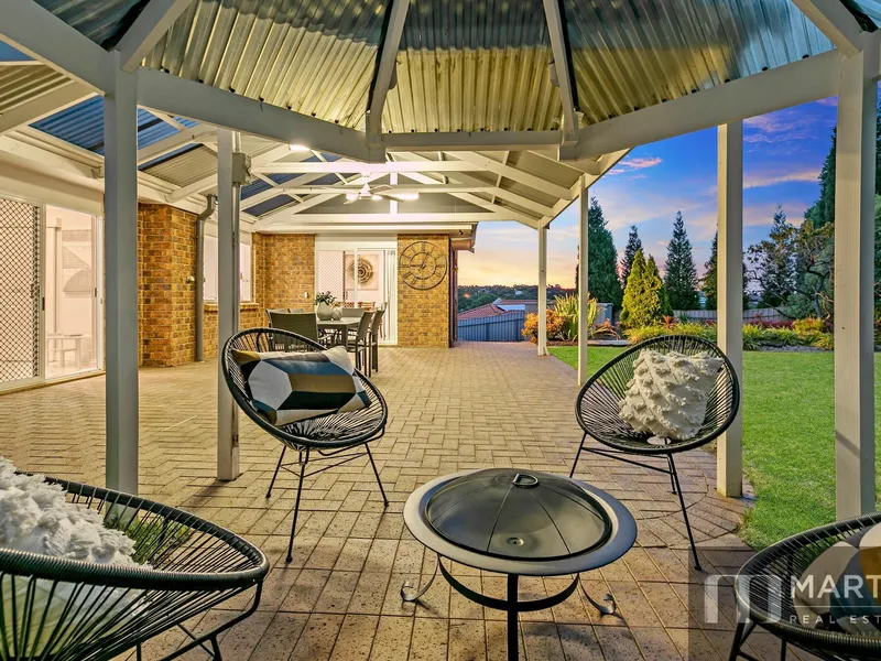 OVERLOOKING COBBLERS CREEK RESERVE WITH STUNNING STREET APPEAL