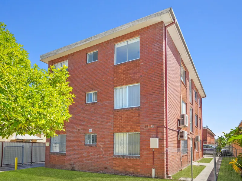 Freshly updated unit boasts convenient locale