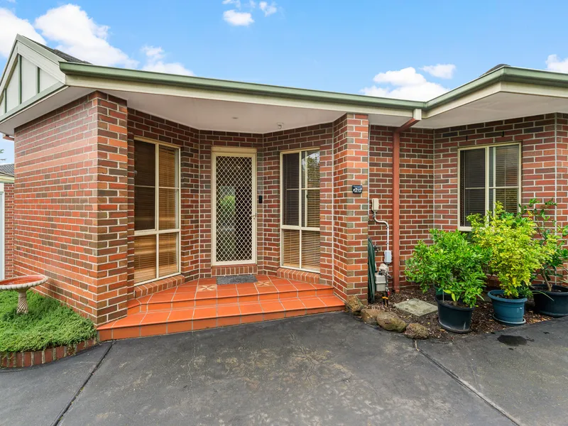 This inviting and spacious single level townhouse is located in a most sought after central location and is one of only three on the block.