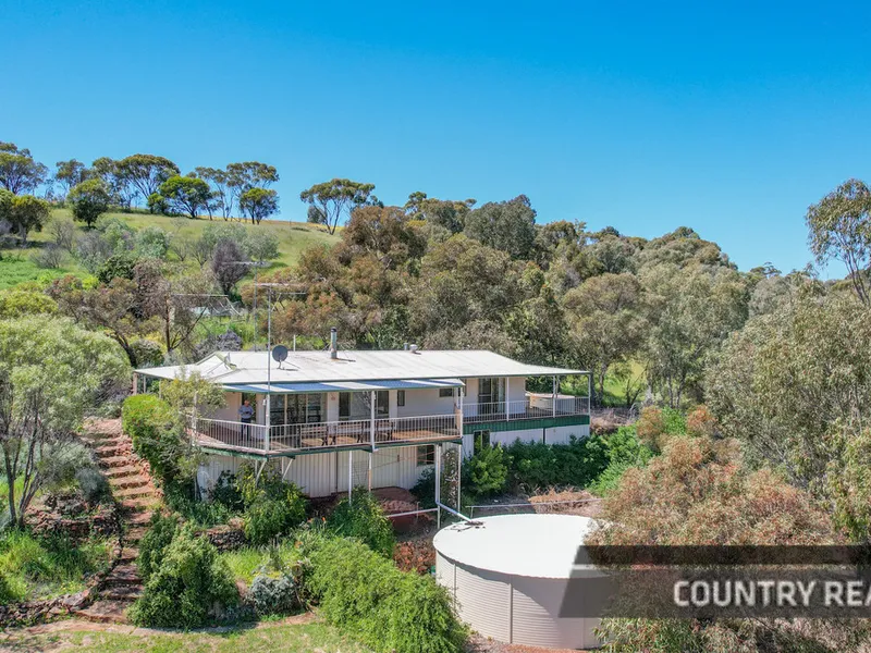 Elevated 3x2 Home with Views on 10 Acres