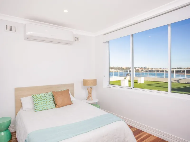 Stunning Fully Furnished Apartment in Ultimate Beachside Location!