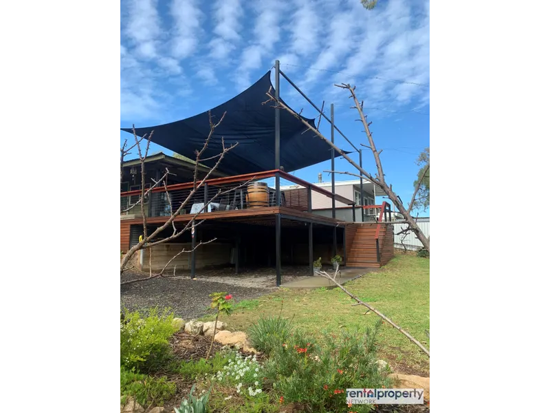 Summer is Coming! Snap up this Great River Hideaway