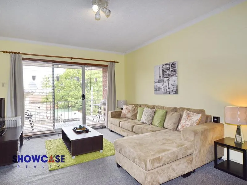 Sitting in a quiet position at the back of complex with security entry, this well presented unit features large living area