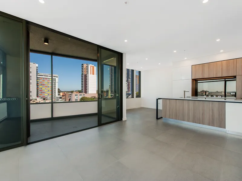 NEAR NEW 2 BEDROOM APARTMENT WITH CITY VIEWS AT NORTH-EAST CORNER - LIGHTHOUSE BURWOOD