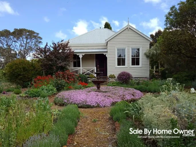 Cottage on 2.7 Ha in town