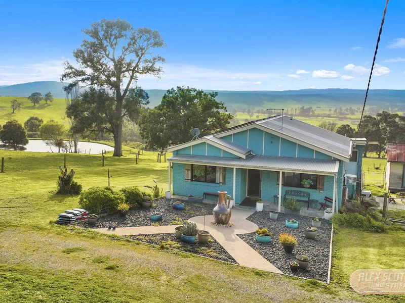 31 Acres + Home with views.